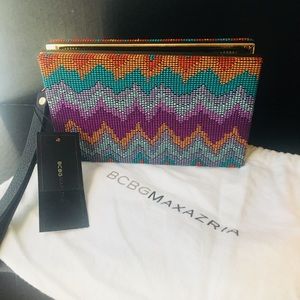 BRAND NEW multicolor wristlet with gold accents.